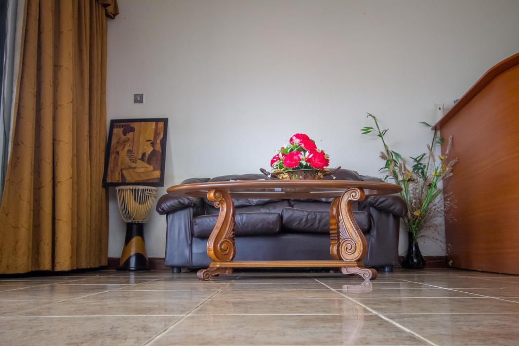 Alfa Hotel Munyonyo Кампала Экстерьер фото